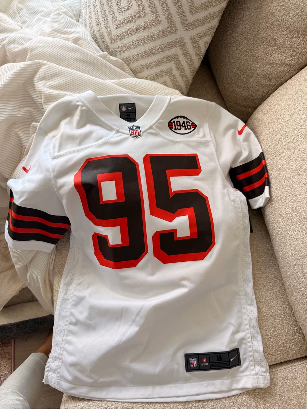 Nike Men’s White NFL #95 Jersey with Black and Red Accents